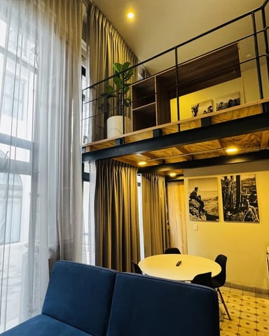 Loft de doble altura con sofá cama en Sonata